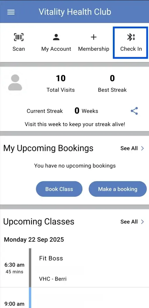 The app check-in screen, with the button a member taps at the door reader